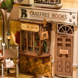 Bogreol miniaturehus byggest i tr med LED lys, Sunshine Town