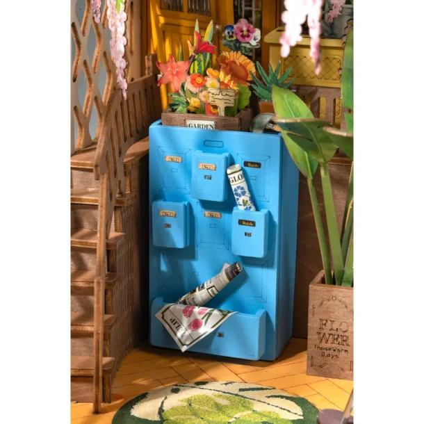 Bogreol miniaturehus byggest i tr med LED lys, Garden House