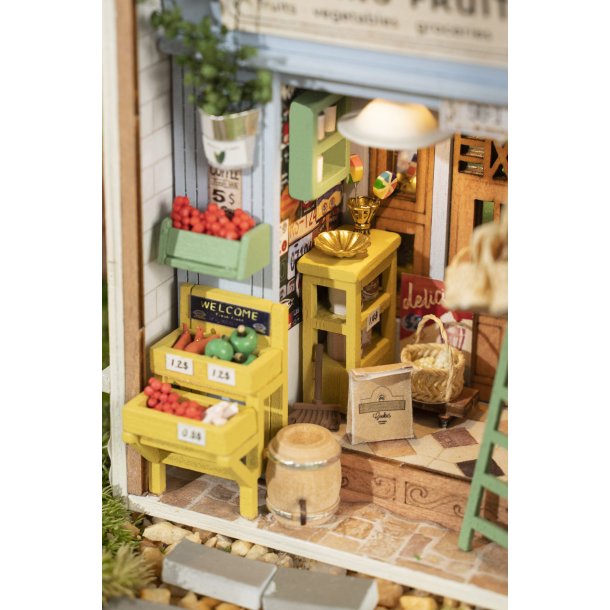 Miniaturehus byggest i tr med LED lys, Morning Fruit Store