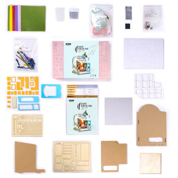 Miniaturehus byggest i tr med LED lys, Dora's Loft