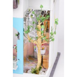 Miniaturehus byggest i tr med LED lys, Dora's Loft