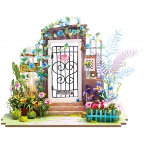 Miniaturehus byggest i tr med LED lys, Garden Entrance