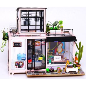 Miniaturehus byggest i tr med LED lys, Kevin's Studio